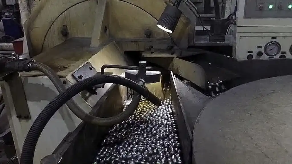 Lapping, a precision machining process in ball bearing manufacturing, achieves tight tolerances, smooth surfaces, and precise geometrical shapes. It employs abrasive slurry or paste and a rotating lap or workpiece to remove material and enhance the surface quality of the bearing components.